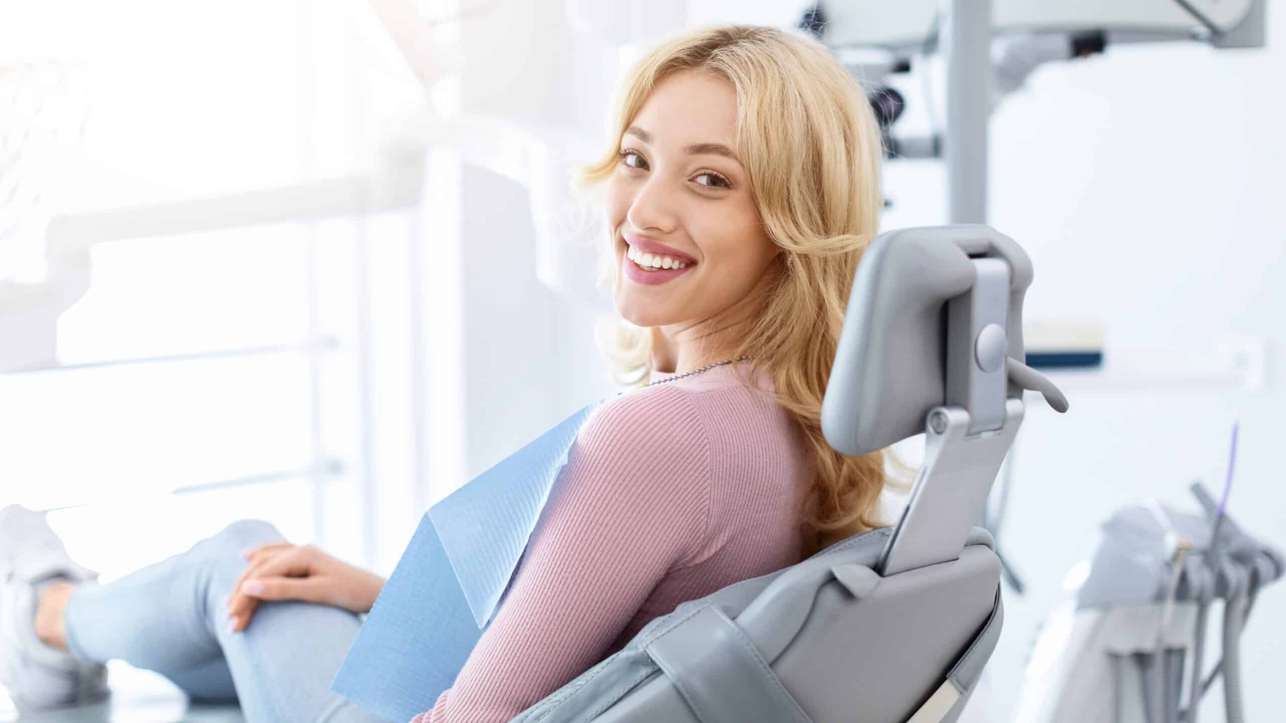 Smiling,And,Relaxed,Young,Woman,Sitting,At,Dental,Chair,In